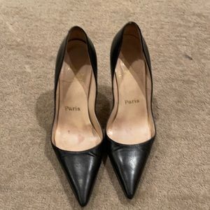 Christian Louboutin black heeled pumps
